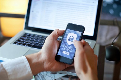 A phone with strong password protection, one way how to protect your business from identity theft.